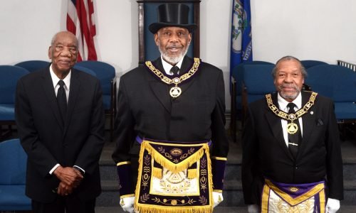 Most Worshipful Grand Master Arnold L. Holmes, center, poses with Honorary Past Grand Master Edward E. Cherry, left, and Honorary Past Grand Master Edward E. Cherry, right, at Prince Hall Masonic Temple in New Haven, Conn. Feb 10. 2022.